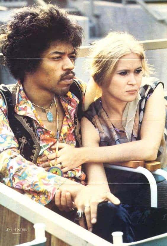 American guitarist Jimi Hendrix (1942 – 1970) sits next to Carmen Borrero in a Pool Box seat during afternoon sound check at the Hollywood Bowl, California, US, September 14, 1968.