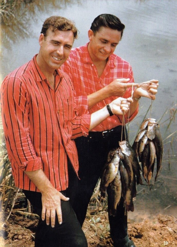 Johnny Horton and Johnny Cash, fishing in Louisiana, 1959.