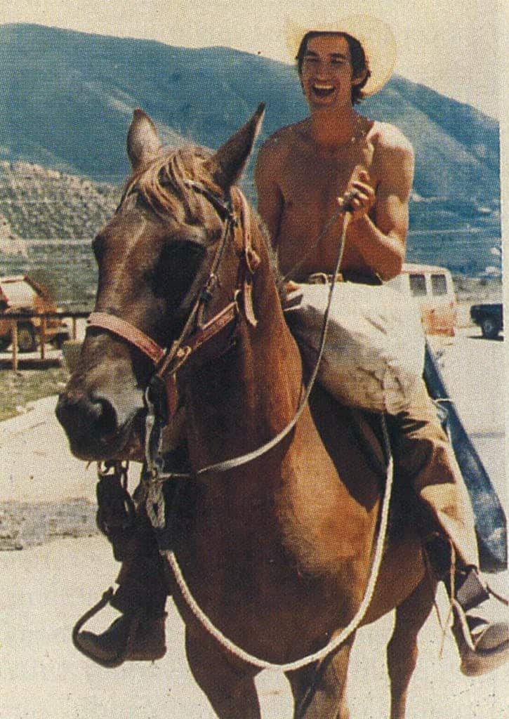 Townes Van Zandt riding a horse.