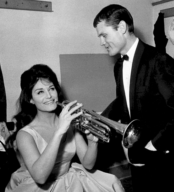 Dalida and Chet Baker in her dressing room at the Rome Brancaccio theatre before a concert in which the two artists performed together, Italy (1962).